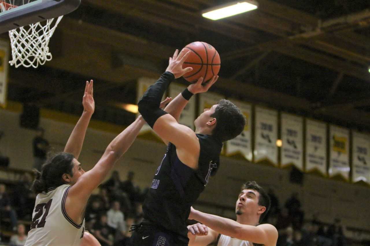 Cascade Christian's Keegan Schaan goes up for a shot against Dayton on Thursday night. (NW Sports Photography)