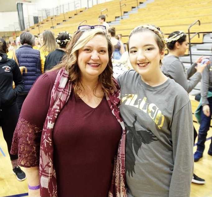 Scappoose coach Pam Didier-Delwisch, with her daughter, Cassidy Didier, following a dance team competition.