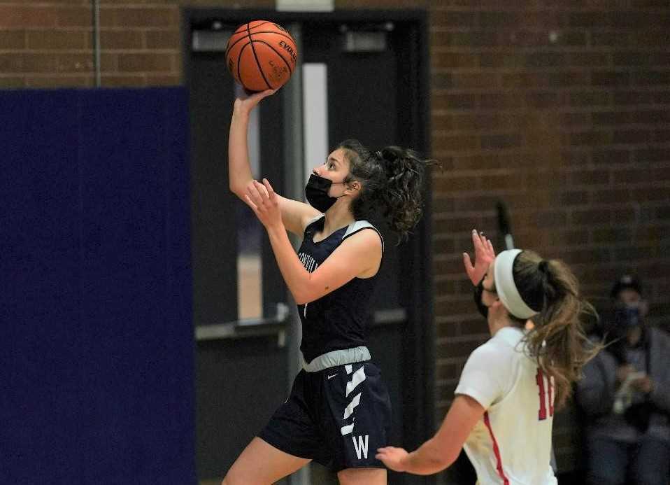 Wilsonville's Karina Borgen goes up for two of her game-high 24 points Monday at La Salle Prep. (Photo by Jon Olson)