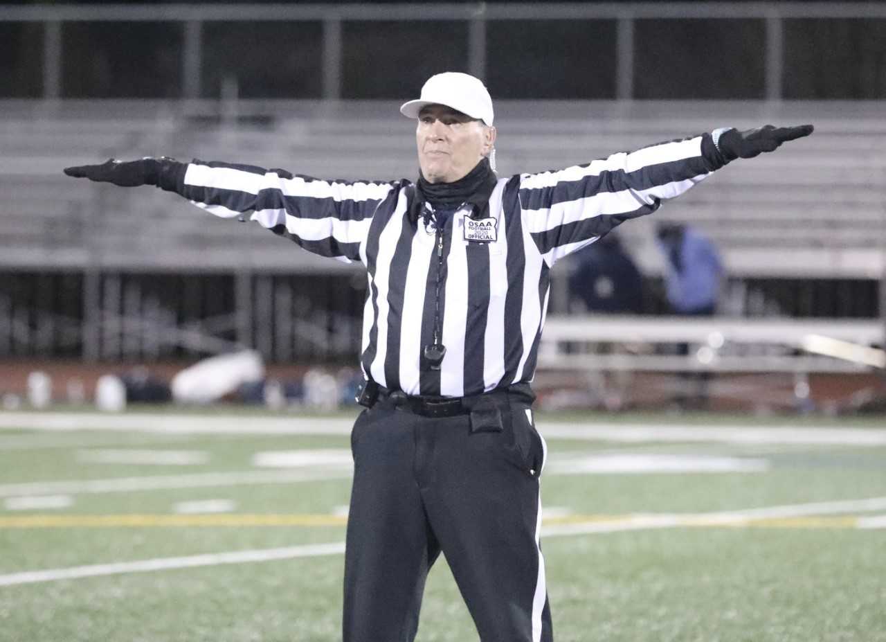 The OSAA registered 582 football officials in 2021-22, an increase from 537 the previous year. (Photo by Norm Maves Jr.)