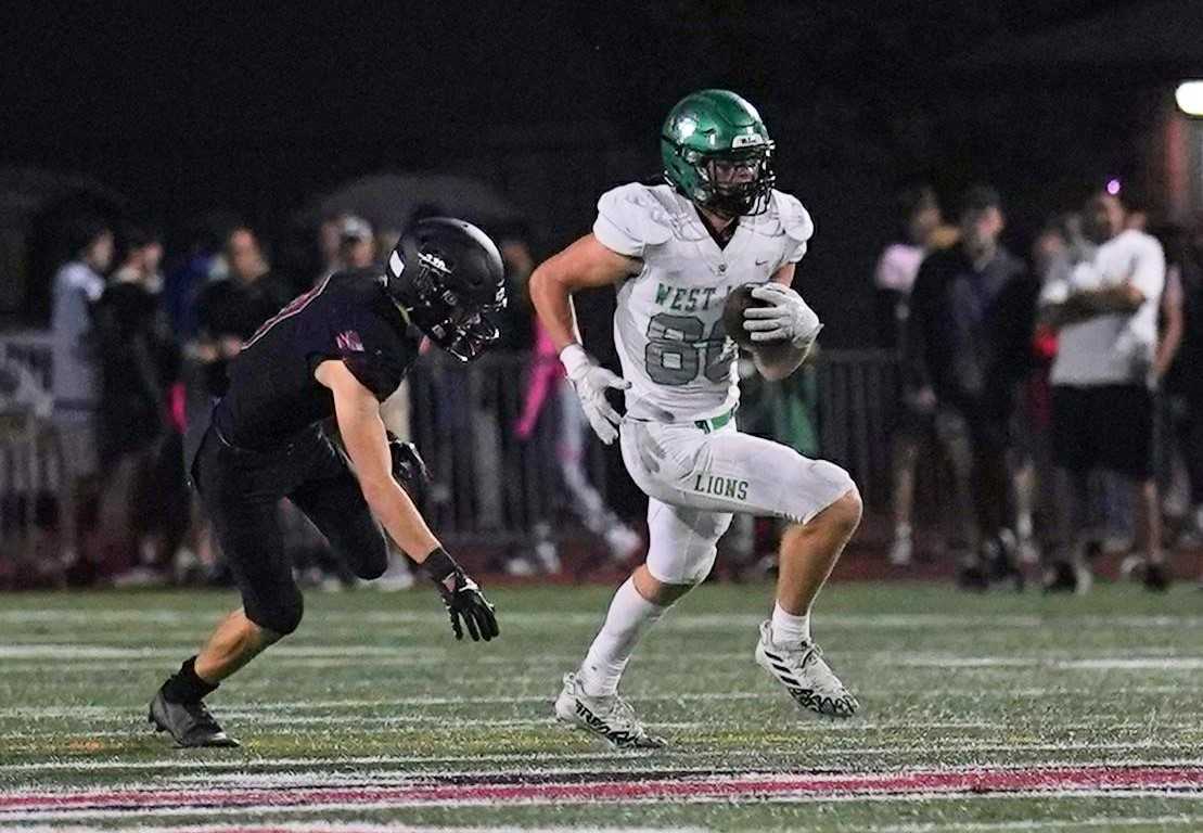 West Linn's Gus Donnerberg (80) had five catches for 82 yards and one touchdown Friday night at Tualatin. (Photo by Jon Olson)