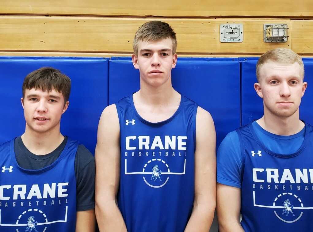 Crane's (from left) Carter Nichols, Cody Siegner and Jared Zander are each averaging about 16 points per game.