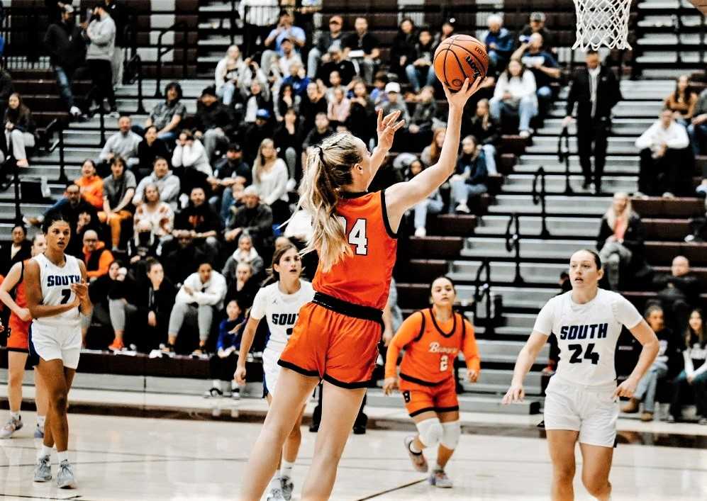 Beaverton's Lainey Spear goes up for two points in the second half against South Medford. (Photo by Fanta Mithmeuangneua)
