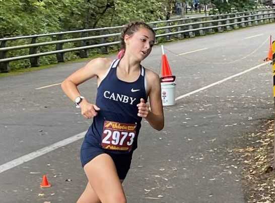After winning the NWOC district meet, Canby's MacKenzie Bigej will race in the 5A meet for the first time. (Photo by Bob Webber)