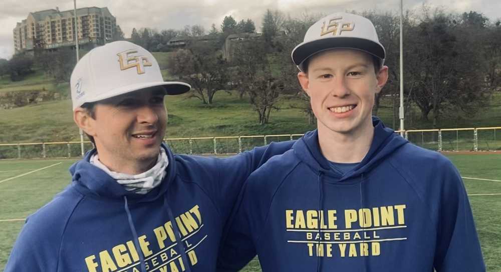 RHP Ian Isackson (right) won the first game of the 2024 season for Eagle Point. He poses here with ass't coach Spencer Duggan