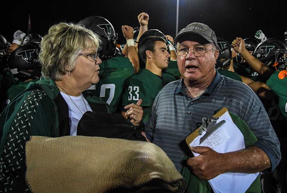 Craig Ruecker, with wife Beverly, led Tigard to the semifinals five times in the last seven seasons. (Photo by Ralph Greene)