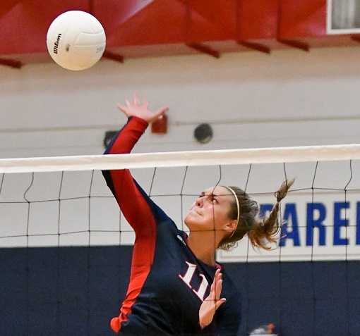 Kennedy's Sophia Carley attacks against Salem Academy. (Photo by Andre Panse)
