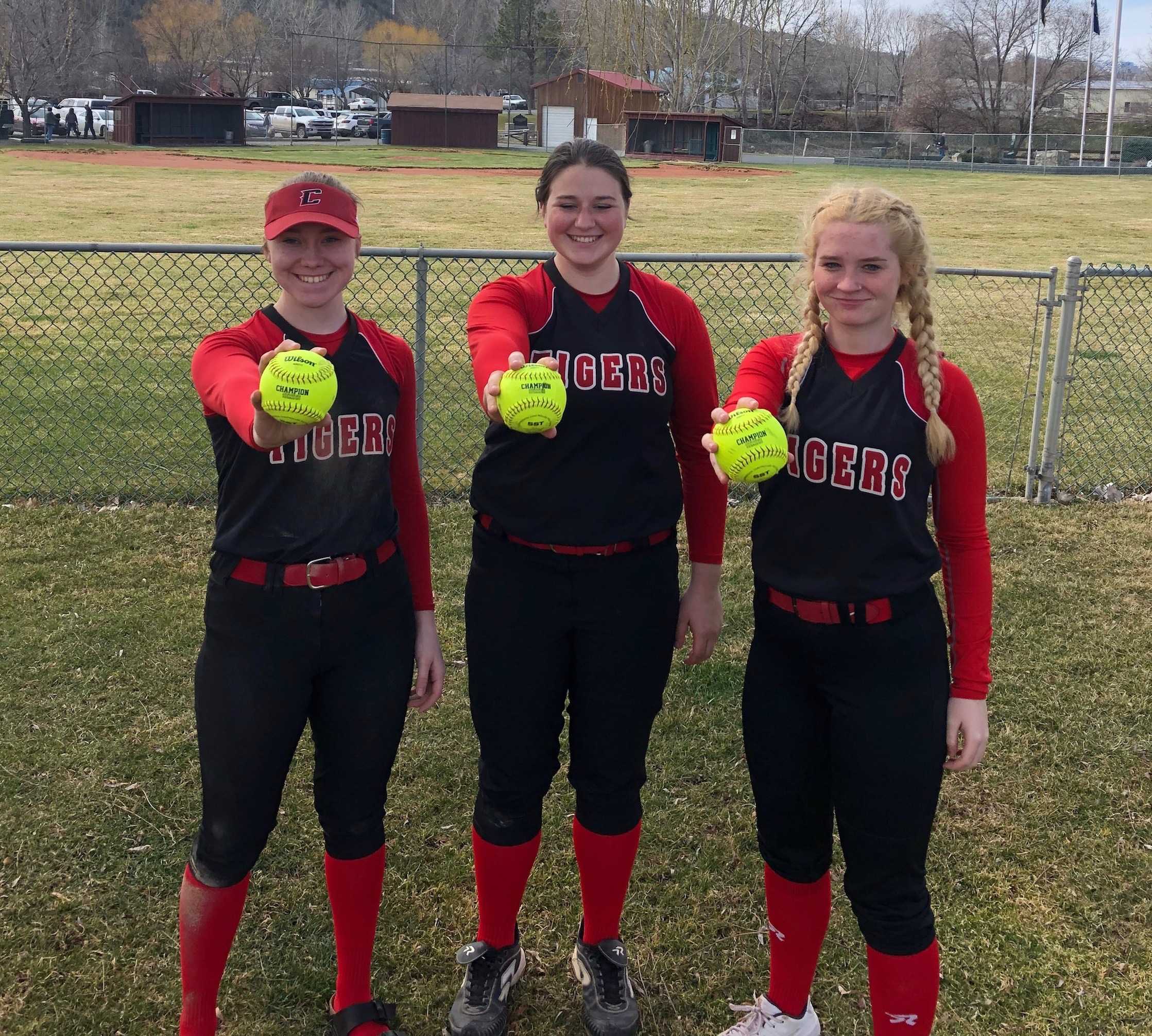 Clatskanie's (from left) Alexis Smith, Kaity Sizemore and Sammie Hummer hit home runs in the same game. (Photo by Mary Sizemore)