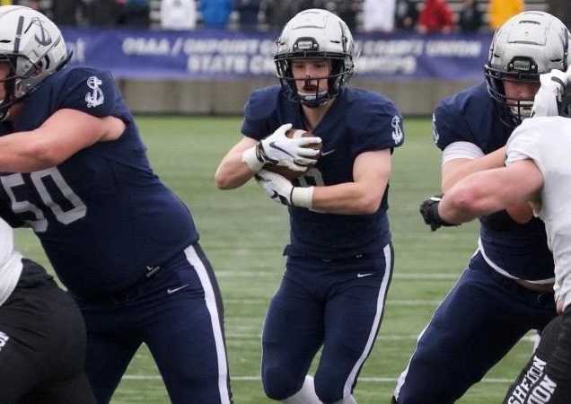 Lake Oswego's Casey Filkins rushed for 210 yards and three touchdowns in the season opener. (Photo by Norm Maves Jr.)