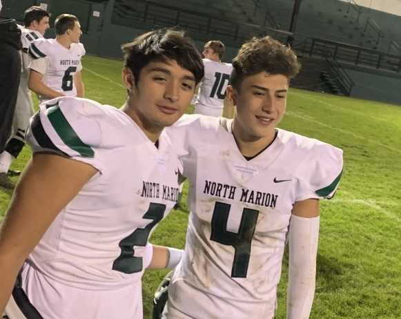 North Marion's Sergio Jimenez (2) and Tanner Saucedo (4) connected for a touchdown pass Thursday. (Photo by Lane Jensen)