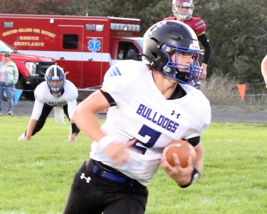 Senior running back Case Wells is a key blocker in Sutherlin's wing-T offense. (Photo by Wade Wells)