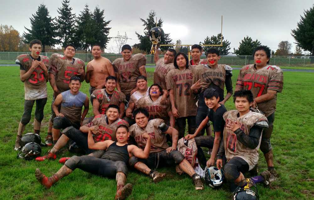 This photo was taken during the winless '16 season. Muddied and bloodied, they still played and practiced hard and with smiles.