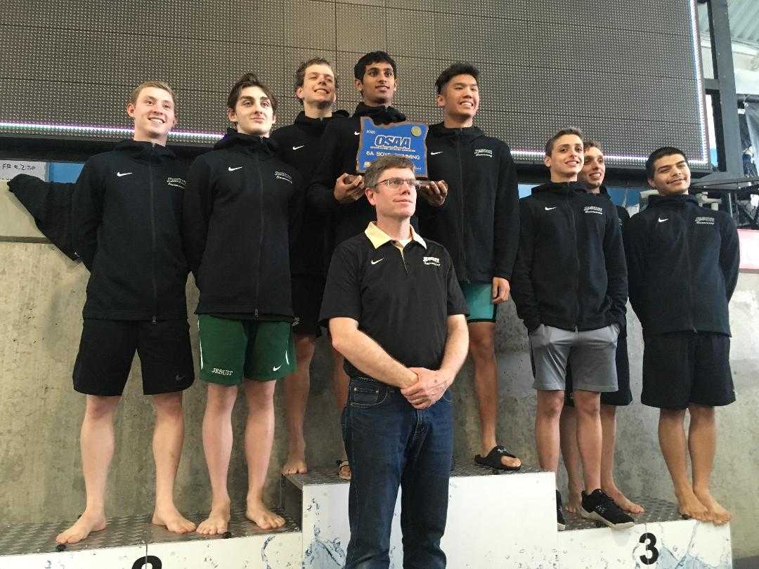 Bryan Butcher has led Jesuit's boys swim team to six consecutive 6A titles.