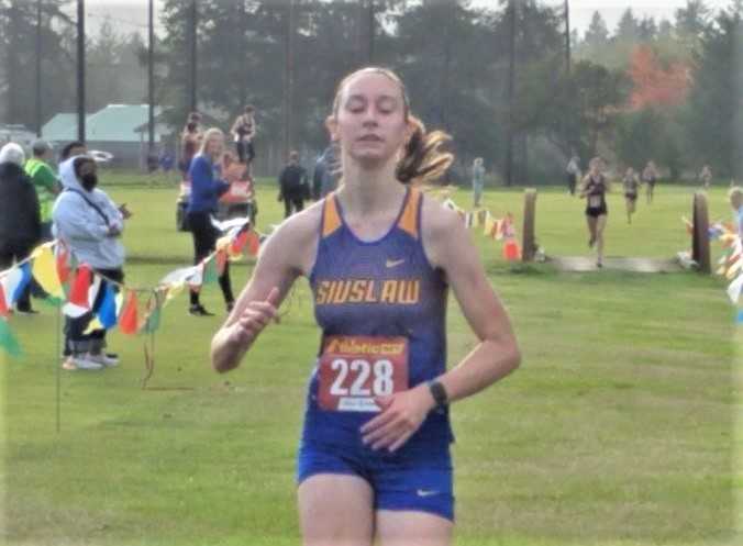 Rylee Colton led five Siuslaw runners in the top 13 at the West Coast Classic on Friday. (Photo by Andrew Millbrooke)