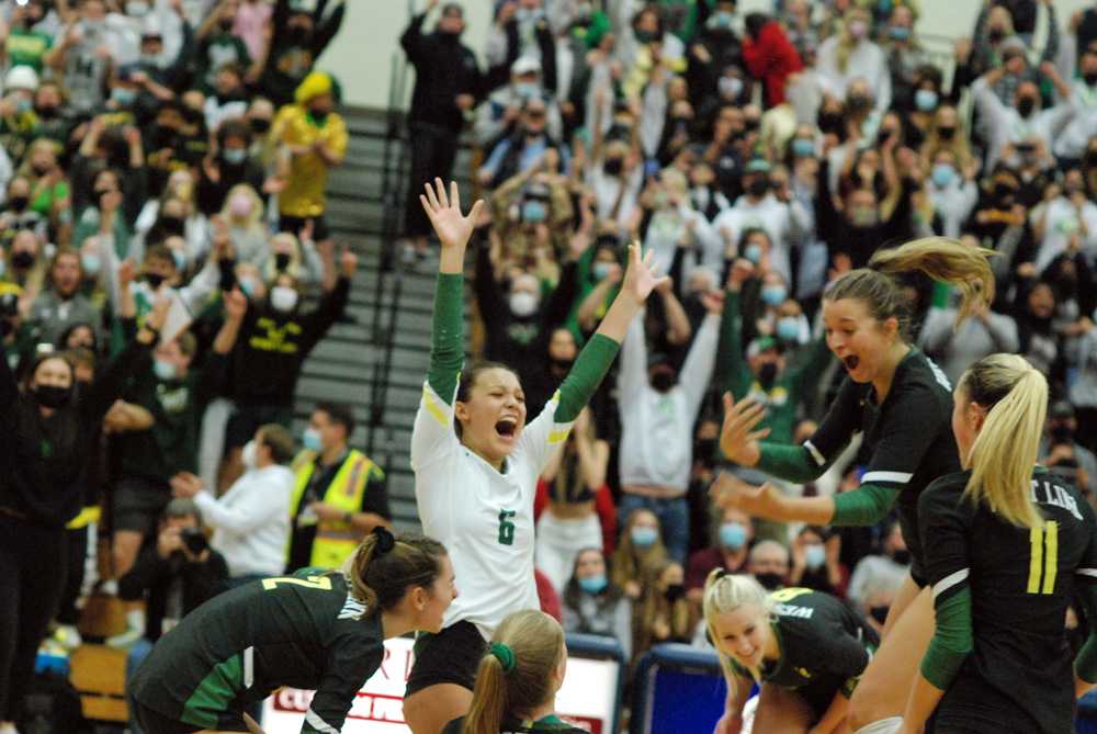 Audrey Shih (6), her West Linn teammates and a spirited Lion crowd celebrate a sweep of Jesuit for the 6A title