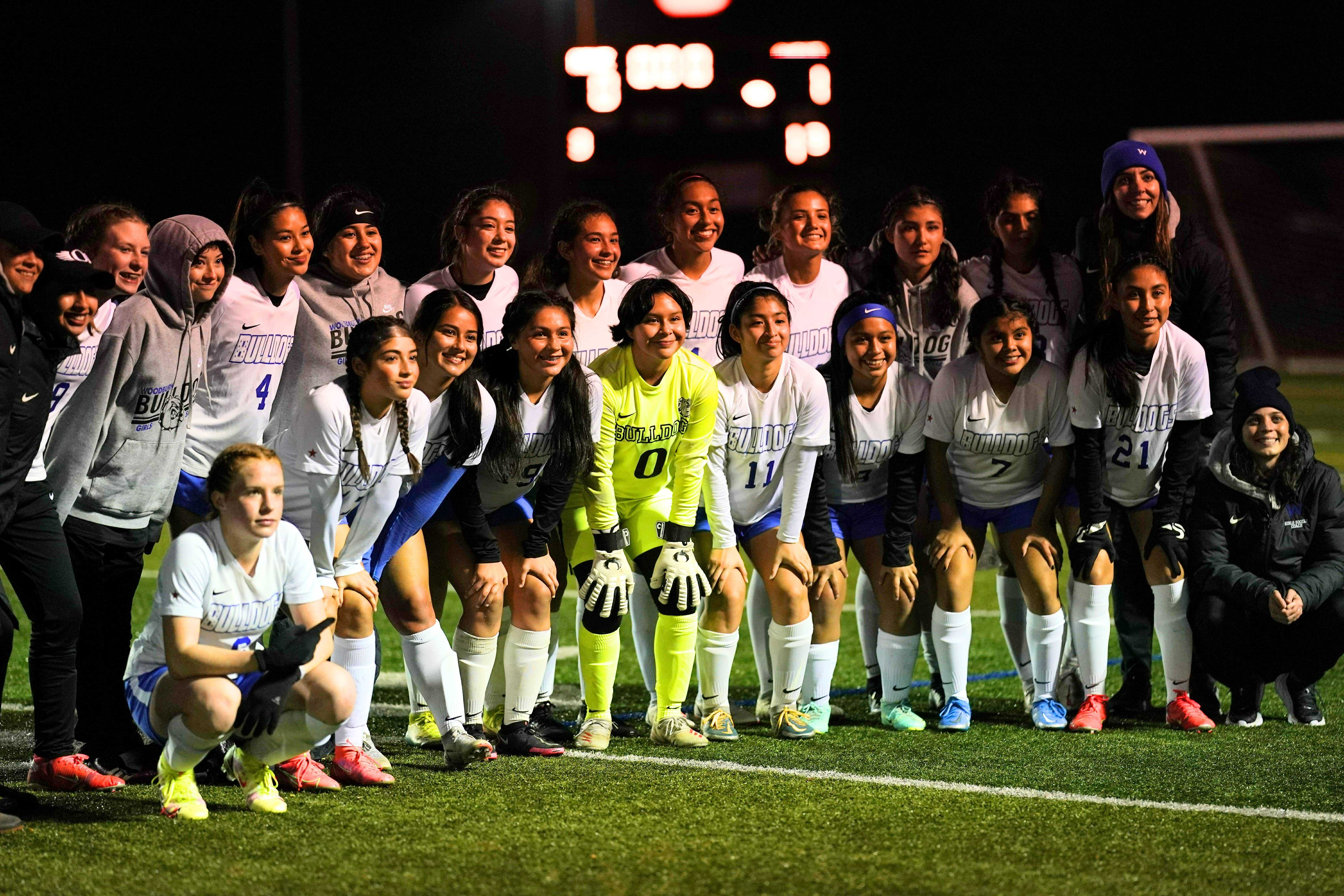 Woodburn's girls soccer team poses after winning 1-0 at Gladstone in a 4A semifinal Tuesday night. (Photo by Jon Olson)