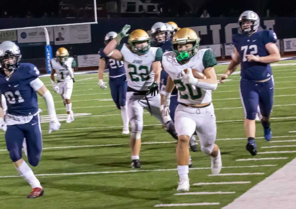 Jesuit's Michael Rincon rushed for 178 of his 217 yards in the second half Friday at Lake Oswego. (Photo by John Miller)