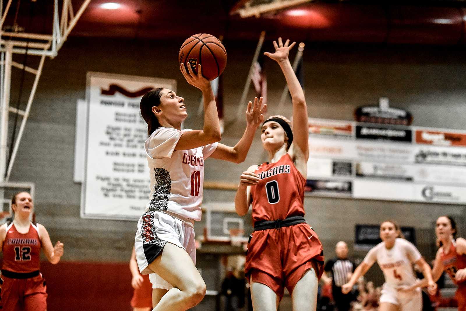 Madison Norton made three three-pointers and scored 13 points for Oregon City on Wednesday. (Photo by Fanta Mithmeuangneua)
