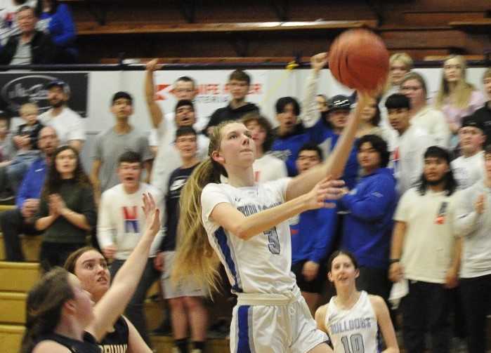 Nyssa's Gracie Johnson drives to the hoop in Thursday's win over Brookings-Harbor. (John Gunther/The World)