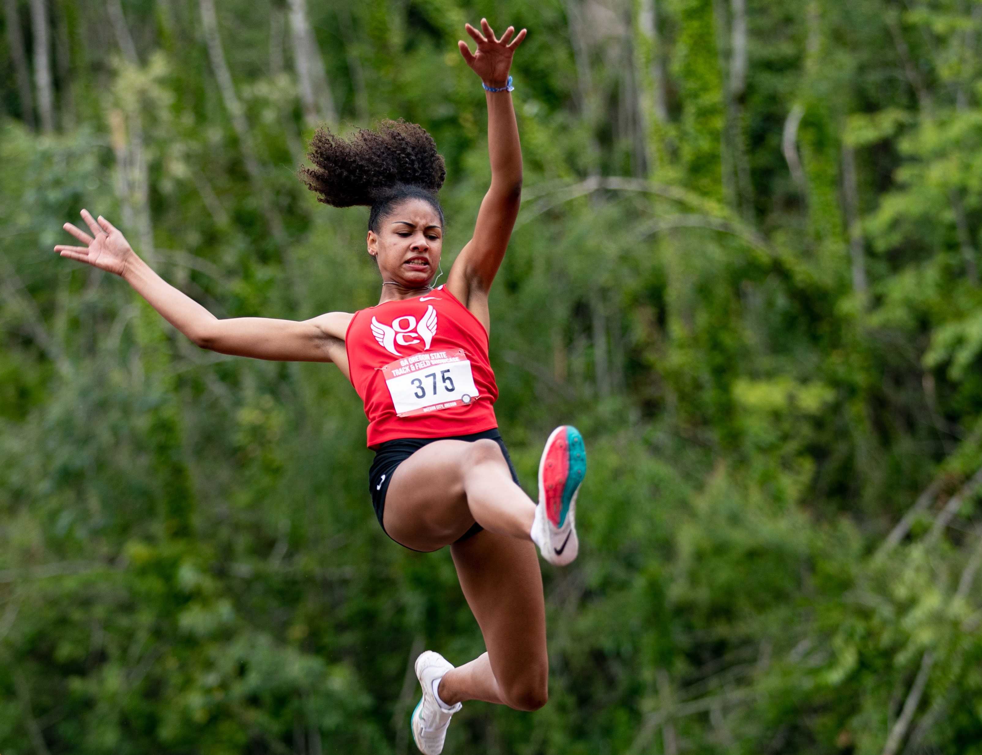 Oregon City junior Sophia Beckmon is looking to build on her state record in the long jump this season. (Photo by Howard Lao)
