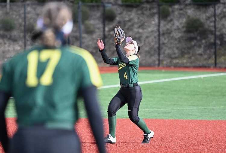 Jesuit shortstop Kacy Lyman prepares to catch a pop-up in Wednesday's 2-1 home win over McNary. (Photo by Carlos Regnier)