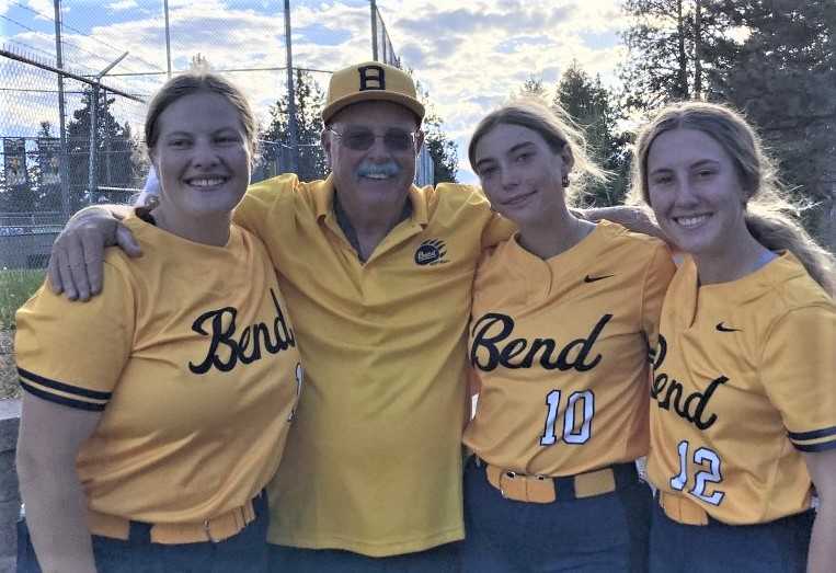 Bend coach Tom Mauldin with last season's seniors: (from left) Lena Zahniser, Violet Loftus and Emma Sullivan. (Courtesy photo)