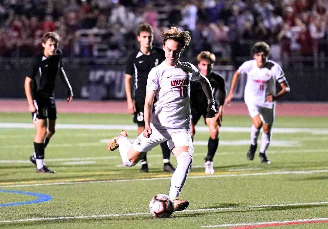 Lincoln's Gunder Miller scored twice against Jesuit, giving him a team-high 11 goals this season. (Photo by Jon Olson)