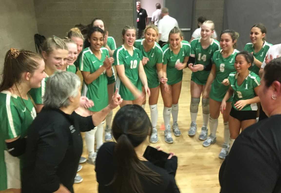 Jesuit coach Teresa Zimmerlee addresses her players after Friday's five-set semifinal win over Nelson.