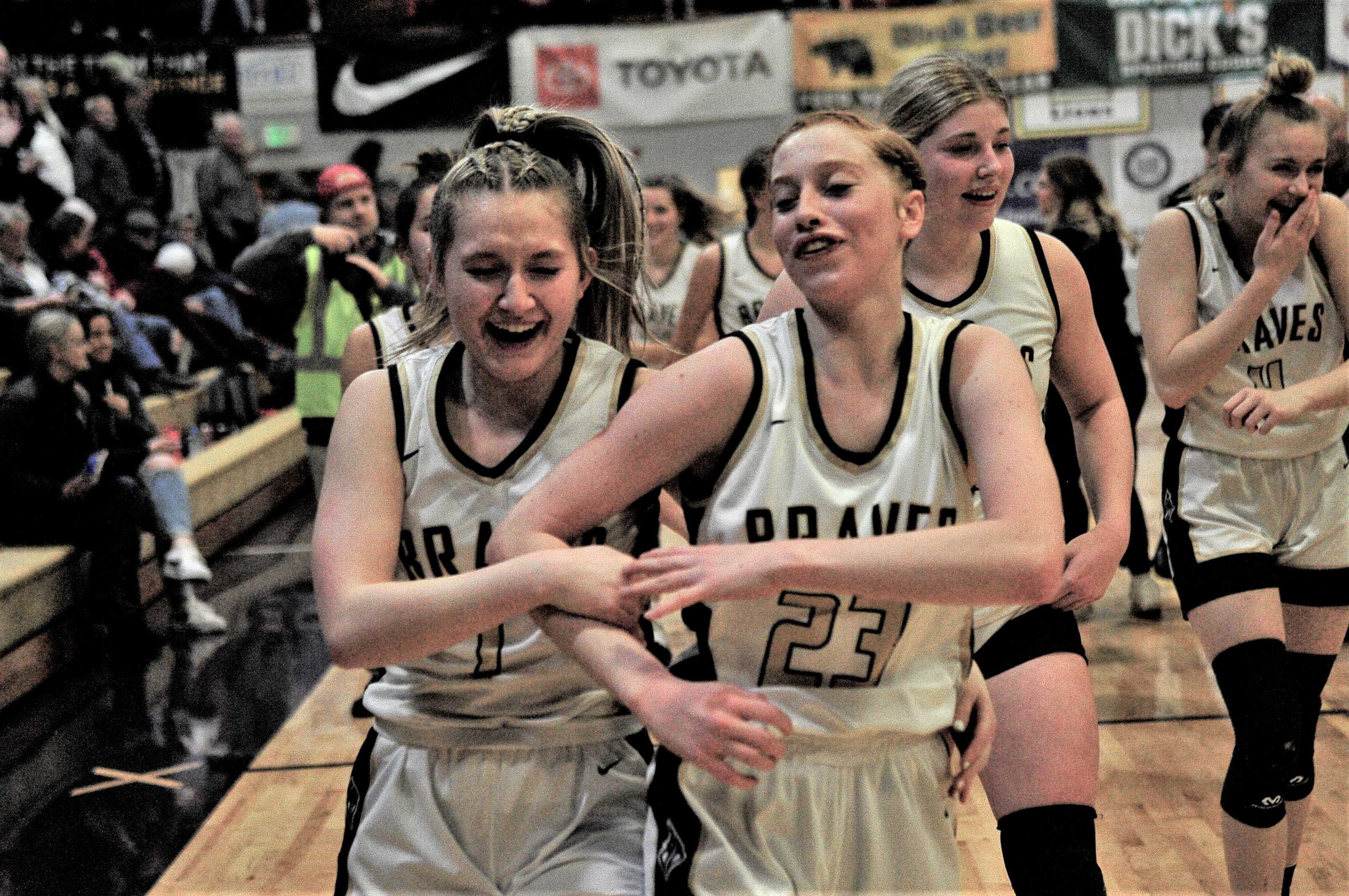 Tyler Rose and Hailey Evans celebrate Banks' state title Saturday night. (Photo by John Gunther)