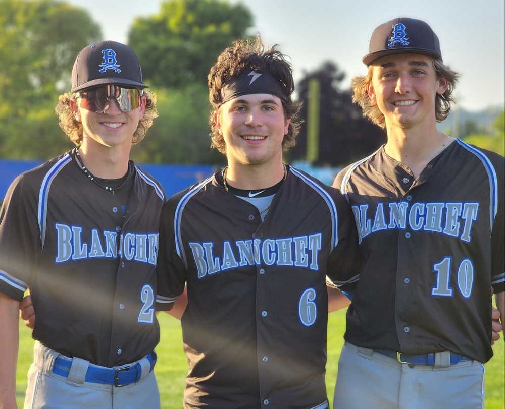 Blanchet Catholic made history on Tuesday behind SP Drew Bartels (left), RP Spencer Kowalski (center) and C Carson McNally