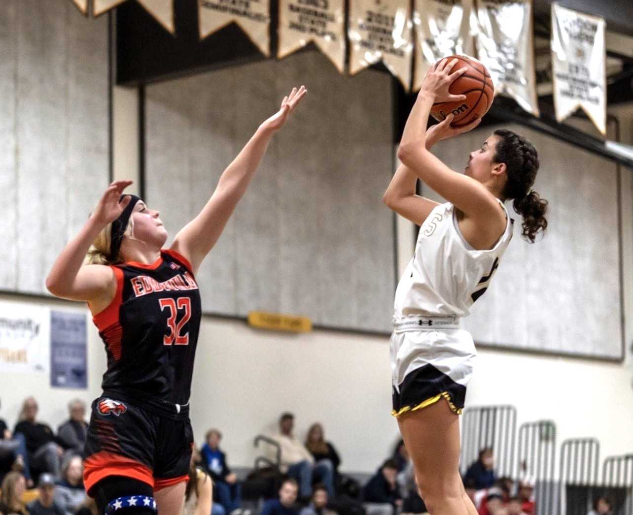Bandon senior guard Katelyn Senn (right) is averaging 16.1 points, 7.5 rebounds and 2.5 assists. (Tom Hutton Photography)