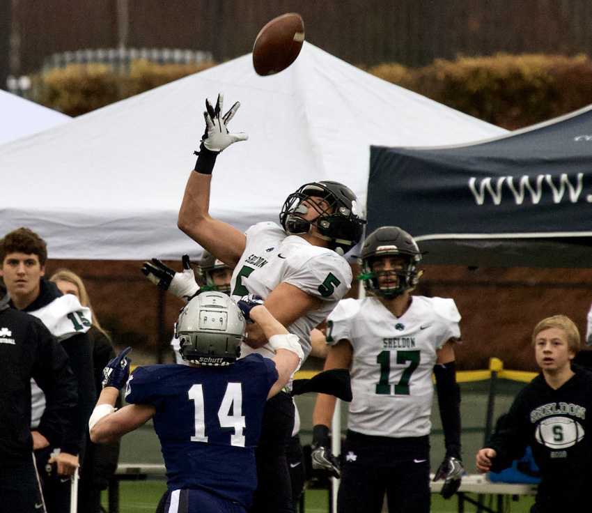 Patrick Herbert hauls in the 43-yard pass late in the fourth quarter to give Sheldon a chance. Photo by Norm Maves, Jr.