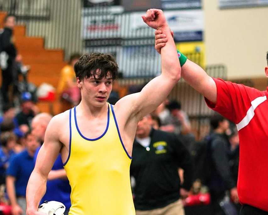 Newberg junior Gus Amerson did not allow a point in winning freestyle and Greco-Roman championships. (Photo by Jon Olson)