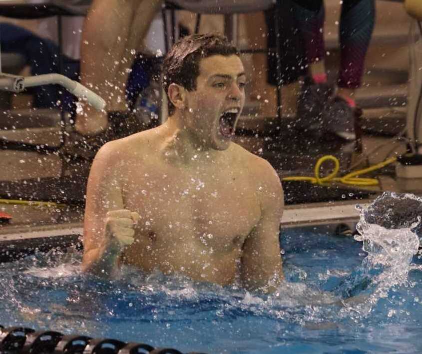Newport's Lucas Ellingson-Cosenza reacts to his school-record time in the 500-yard freestyle at last year's state meet.