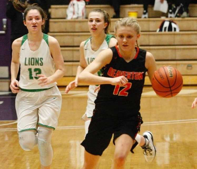 Beaverton's Mary Kay Naro races up the court past West Linn's Elisabeth Dombrow (13) and Cami Fulcher. (Photo by Norm Maves Jr.)