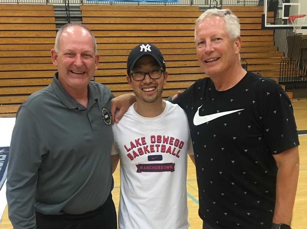 OBCA board members Roger Schenk (left) and Pat Coons (right) with Lake Oswego coach Marshall Cho.