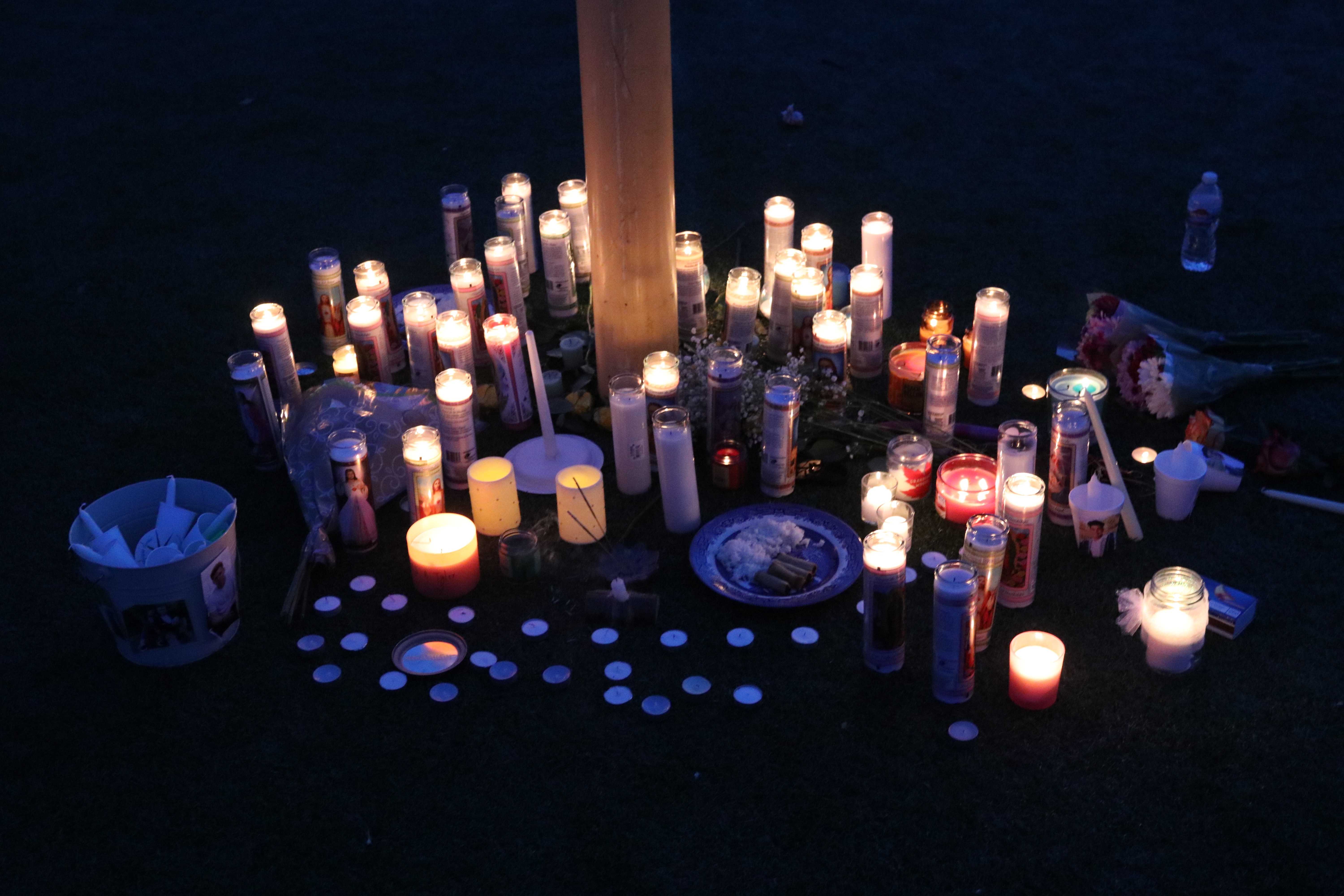 A candlelight memorial in honor of Santos and Bracken at Skyhawk Stadium. (Hunter Mann)