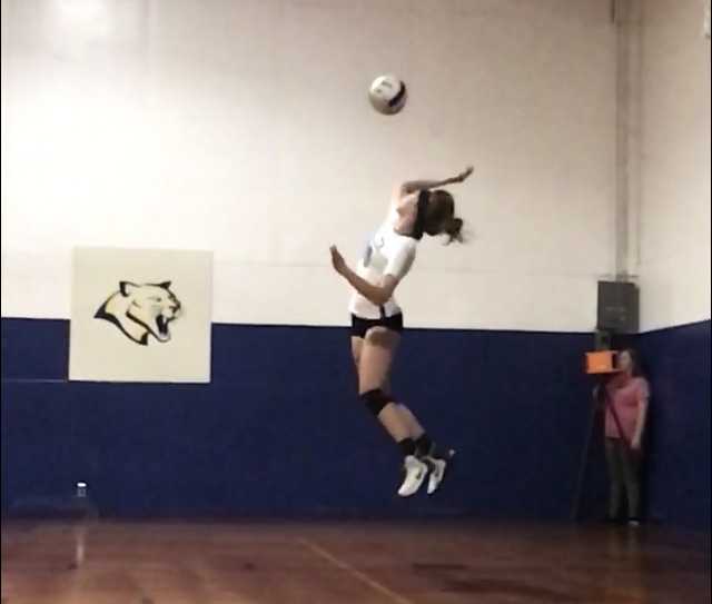Jessica Carlisle of Alsea shows off her devastating jump serve